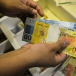 Caixa paga novo Bolsa Família a beneficiários com NIS de final 6