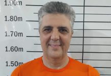 Preso pela Polícia Federal, ex-prefeito de Bonfim sorri em foto do sistema prisional