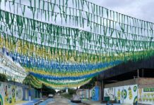 Com 32 mil bandeirinhas, rua de Boa Vista revive tradição das Copas e aposta no hexa Rua Prof Macedo decorada