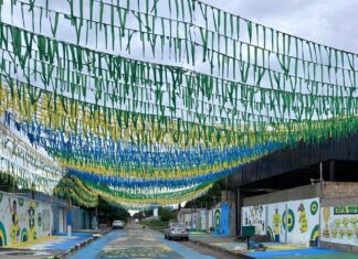 Com 32 mil bandeirinhas, rua de Boa Vista revive tradição das Copas e aposta no hexa Rua Prof Macedo decorada