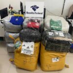 Receita Federal apreende quase meia tonelada de camisas esportivas falsificadas em transportadora de Boa Vista Camisas apreendidas Receita Federal
